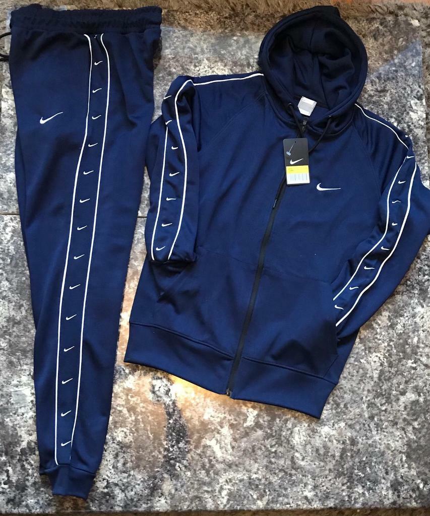nike swoosh tracksuit blue